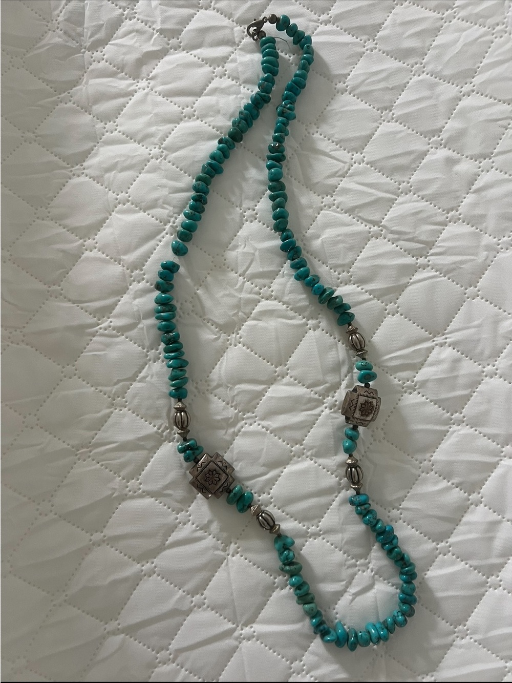 Native American, Navajo-style jewelry featuring sterling silver accent beads